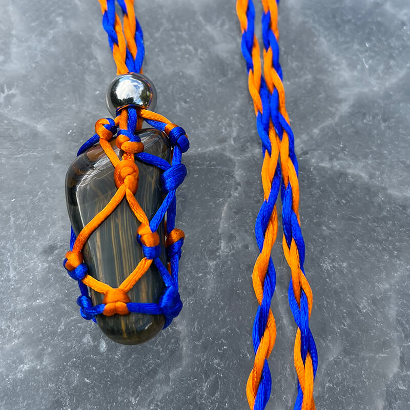 For the Gator Fans! Blue Tiger's Eye gator head shaped stone -- with orange and blue cord and handmade crystal holder.